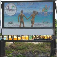 Sign at entrance to nude section