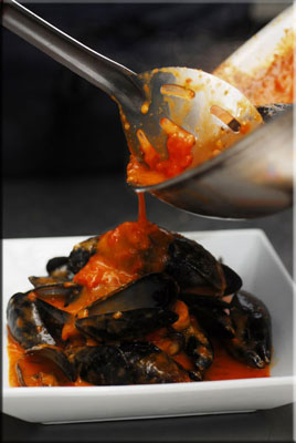 Mussels with Tomato, Parmesan, and Fine Herbs
